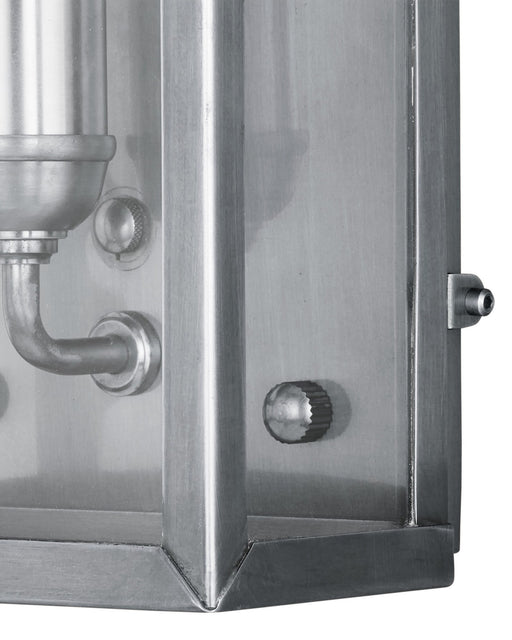 Royster Outdoor Wall Sconce in Antique Silver / Clear