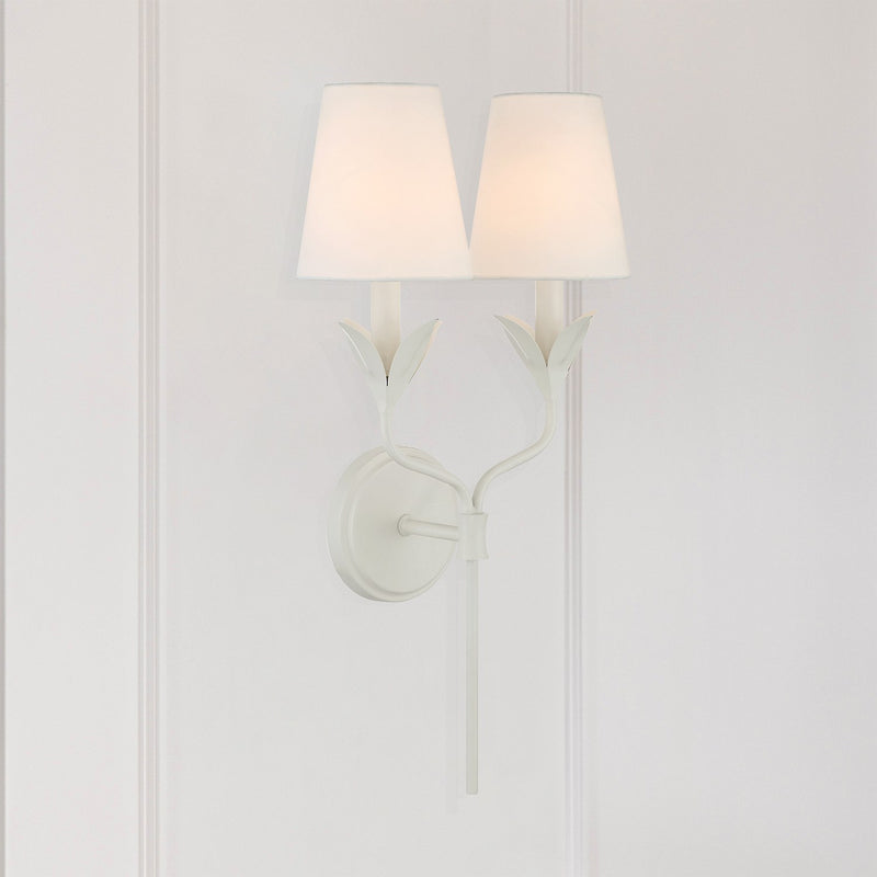 Broche 2 Light 12" Sconce in Matte White in a room setting