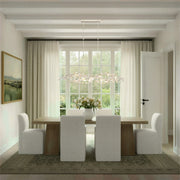 Broche 6 Light 50.5" Linear Chandelier in Matte White in a room setting