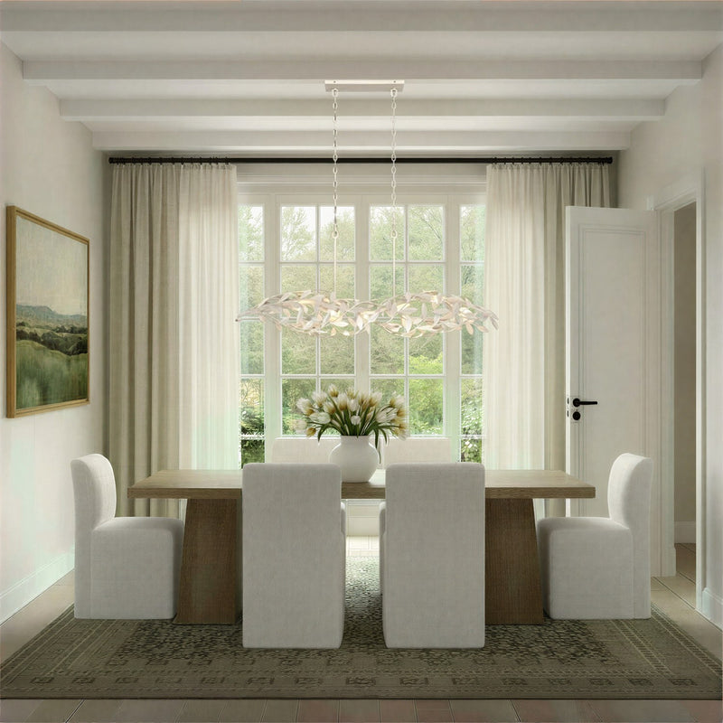 Broche 6 Light 50.5" Linear Chandelier in Matte White in a room setting