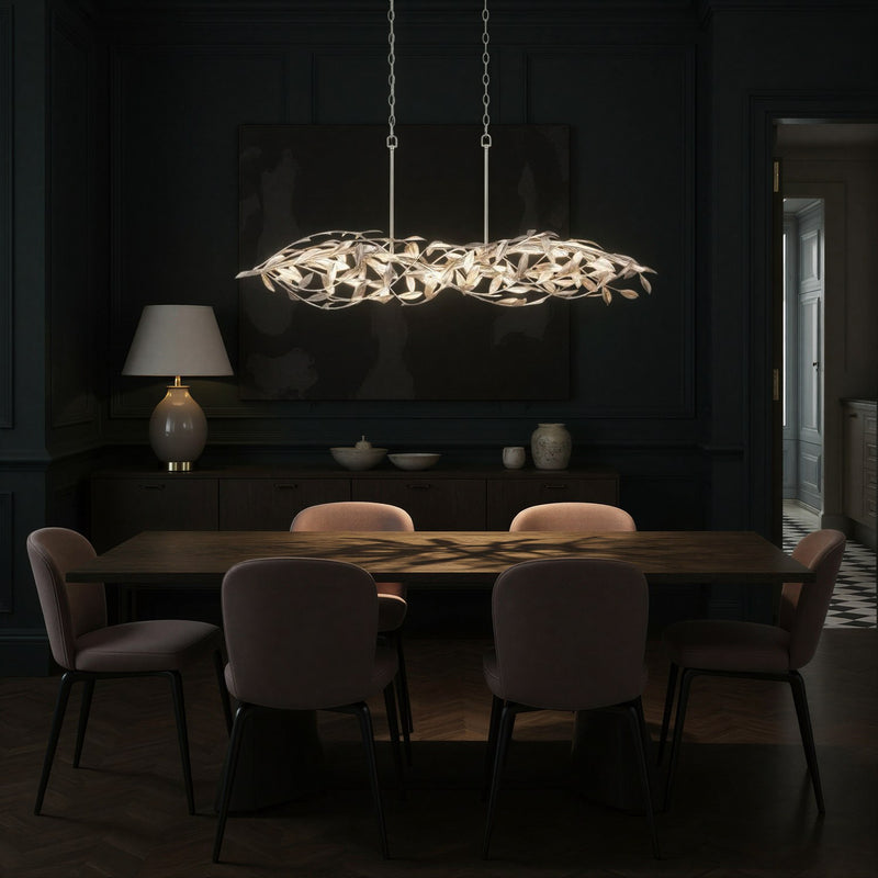 Broche 6 Light 50.5" Linear Chandelier in Antique Silver in a room setting