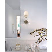 Broche 1 Light 6.5" Sconce in Antique Silver in a room setting