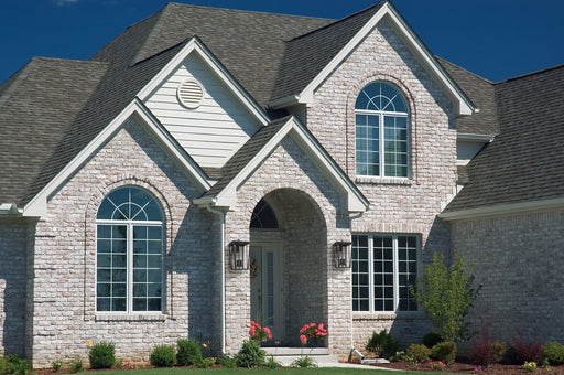 Seoul 4 Light 18" Outdoor Wall Light in Black in a room setting
