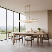 Drama Club 8-Light 48" Linear Pendant in Brass Kisser