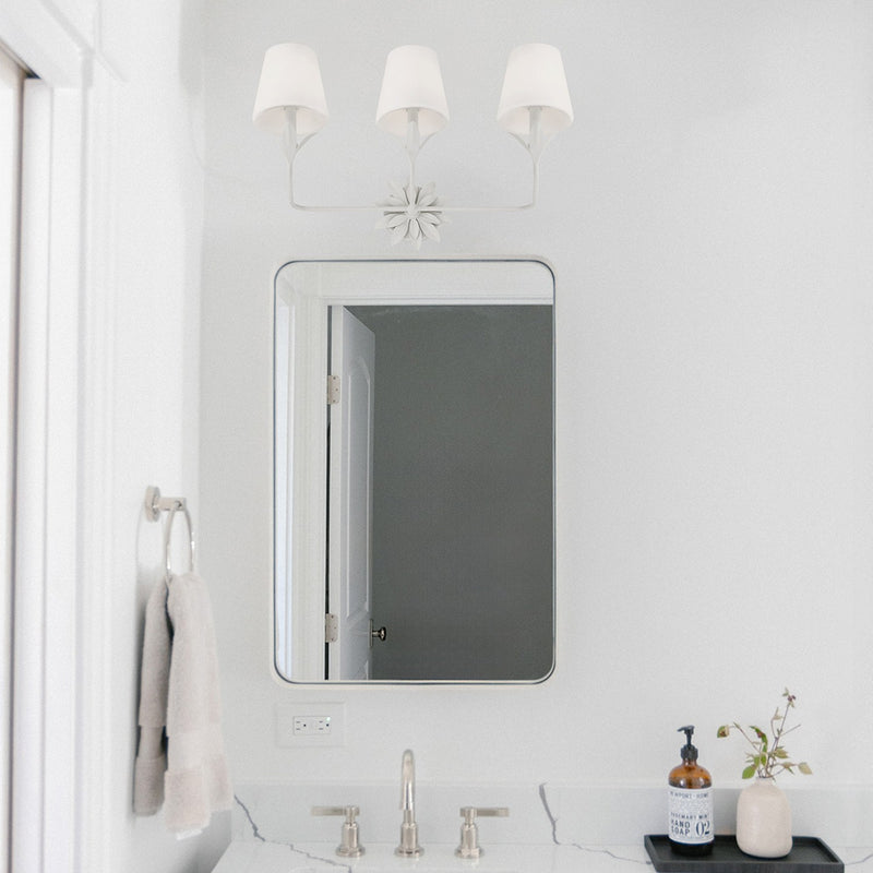 Broche 3 Light 25" Bathroom Vanity in Matte White in a room setting