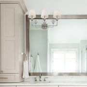Broche 3 Light 25" Bathroom Vanity in Antique Silver in a room setting