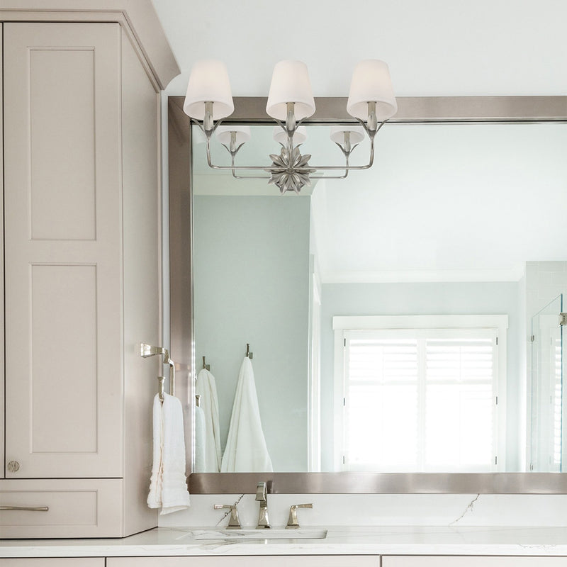 Broche 3 Light 25" Bathroom Vanity in Antique Silver in a room setting