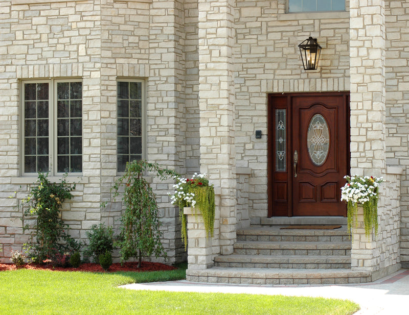 Talbot 3 Light 12.25" Outdoor Wall Light in Oil Rubbed Bronze in a room setting