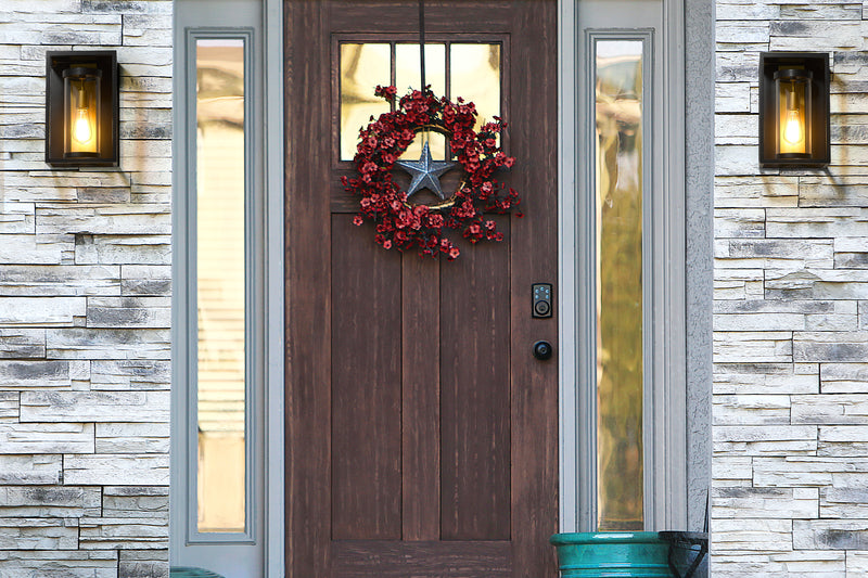 Dunbroch 1 Light 8" Outdoor Wall Light, 13" Tall in Deep Bronze + Outdoor Brass in a room setting