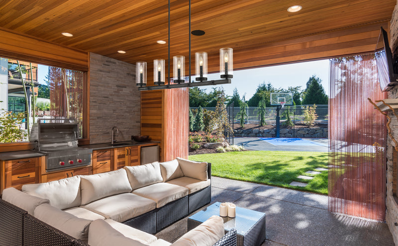 Marlow 5 Light 42" Outdoor Linear Chandelier in Ashen Barnboard in a room setting