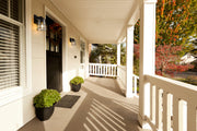 Helix 1 Light 6" Outdoor Wall Light, 9.25" Tall in Black in a room setting