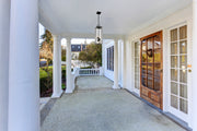 Sana 3 Light 8" Outdoor Chain Mount Ceiling Fixture in Clear Seedy in a room setting