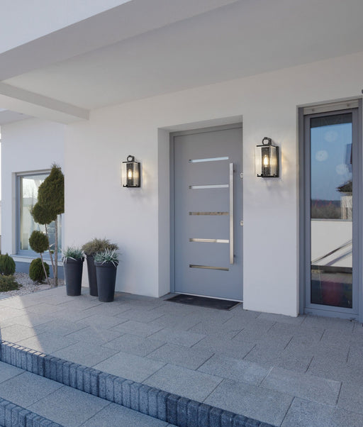 Sana 1 Light 5.75" Outdoor Wall Light in Clear Seedy in a room setting