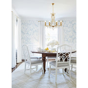 Cedar 8 Light 28" Chandelier in Vibrant Gold in a room setting