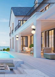 Laurent 2 Light 12" Outdoor Wall Light in White Opal in a room setting