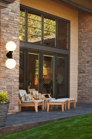 Laurent 2 Light 8" Outdoor Wall Light in White Opal in a room setting