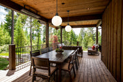 Laurent 1 Light 12" Outdoor Pendant, White Opal Shade in Black in a room setting