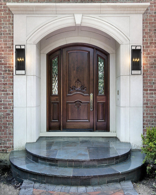 Lucian 3 Light 9" Outdoor Wall Light in Black in a room setting