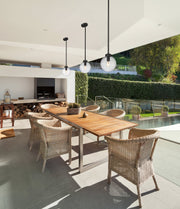 Laurent 1 Light 8" Outdoor Pendant, Clear Seedy Shade in Black in a room setting