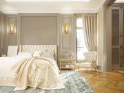 Aideen 1 Light 4.5" Wall Sconce in Tawny Brass in a room setting