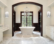 Zander 2 Light 13" Wall Sconce in Brushed Nickel in a room setting