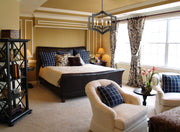 Zander 5 Light 23.6" Chandelier in Bronze in a room setting