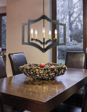 Zander 5 Light 23.6" Chandelier in Bronze in a room setting