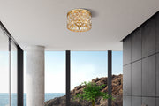 Dealey 5 Light 18" Flush Mount in Heirloom Brass in a room setting