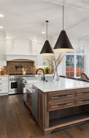 Eaton 1 Light 24" Pendant in Bronze Plate in a room setting