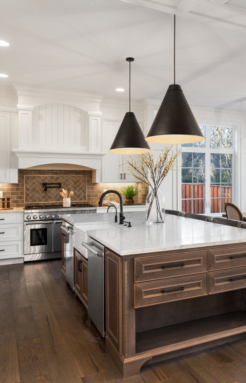 Eaton 1 Light 24" Pendant in Bronze Plate in a room setting