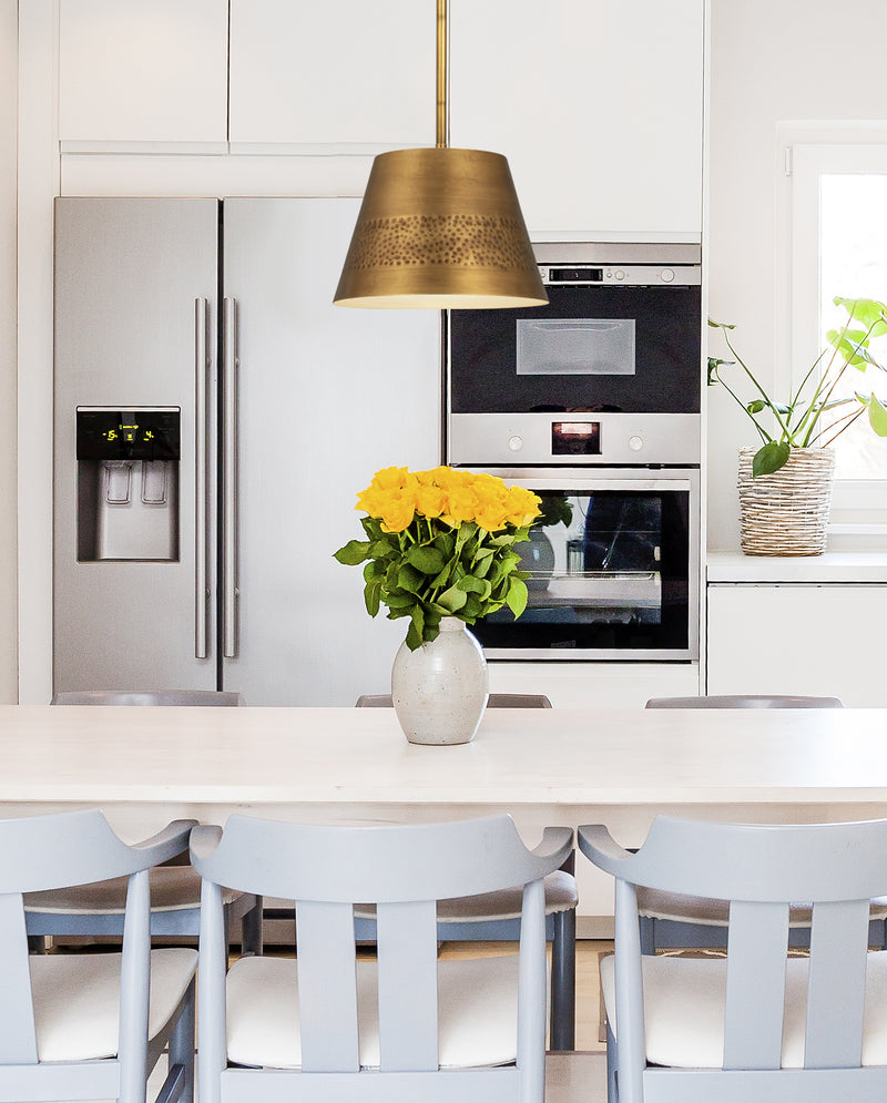 Maddox 1 Light 12" Pendant in Rubbed Brass in a room setting