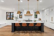 Maddox 1 Light 12" Pendant in Rubbed Brass in a room setting