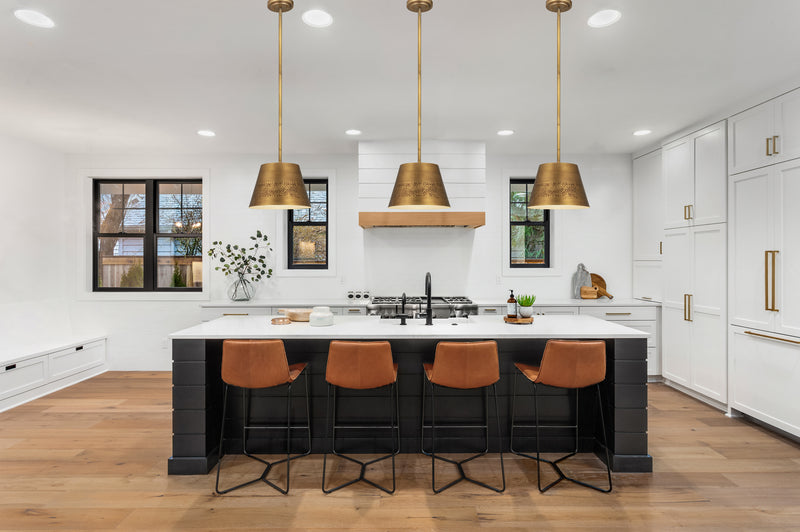 Maddox 1 Light 12" Pendant in Rubbed Brass in a room setting