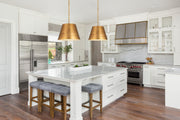 Maddox 1 Light 18" Pendant in Rubbed Brass in a room setting