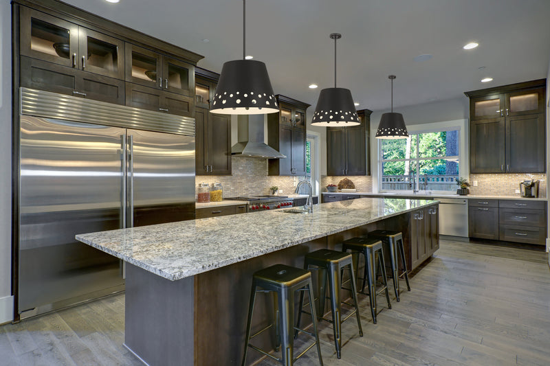 Katie 1 Light 18" Pendant in Matte Black in a room setting