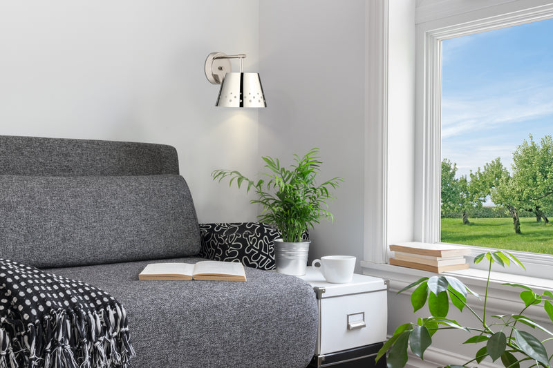 Katie 1 Light 8" Wall Sconce in Polished Nickel in a room setting