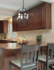 Aranya 4 Light 18.31" Chandelier in Bronze in a room setting