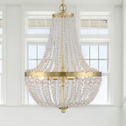 Rylee 3 Light 14" Pendant in Antique Gold in a room setting