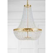 Rylee 8 Light 24.75" Chandelier in Antique Gold in a room setting