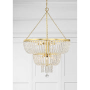 Rylee 8 Light 24.75" Pendant in Antique Gold in a room setting