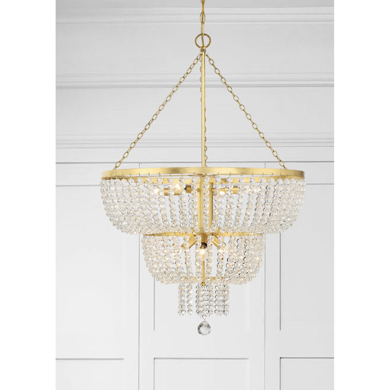 Rylee 8 Light 24.75" Pendant in Antique Gold in a room setting