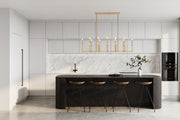 Gaultier 12 Light 56.75" Linear Pendant in Modern Gold in a room setting