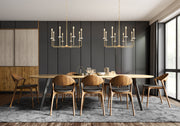Gaultier 8 Light 35.25" Chandelier in Modern Gold in a room setting