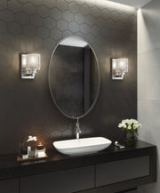 Jacqueline 1 Light 4.75" Wall Sconce in Brushed Nickel in a room setting