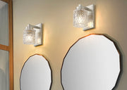 Jacqueline 1 Light 4.75" Wall Sconce in Brushed Nickel in a room setting