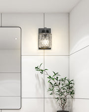 Jacqueline 1 Light 4.75" Wall Sconce in Matte Black in a room setting