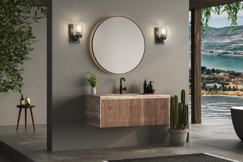 Jacqueline 1 Light 4.75" Wall Sconce in Matte Black in a room setting