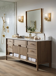 Jacqueline 1 Light 4.75" Wall Sconce in Modern Gold in a room setting