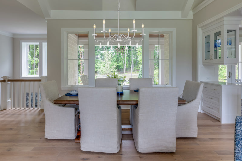 Toussant 6 Light 32" Chandelier in Brushed Nickel in a room setting