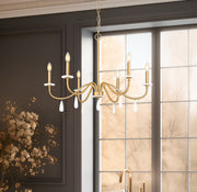 Toussant 6 Light 32" Chandelier in Modern Gold in a room setting